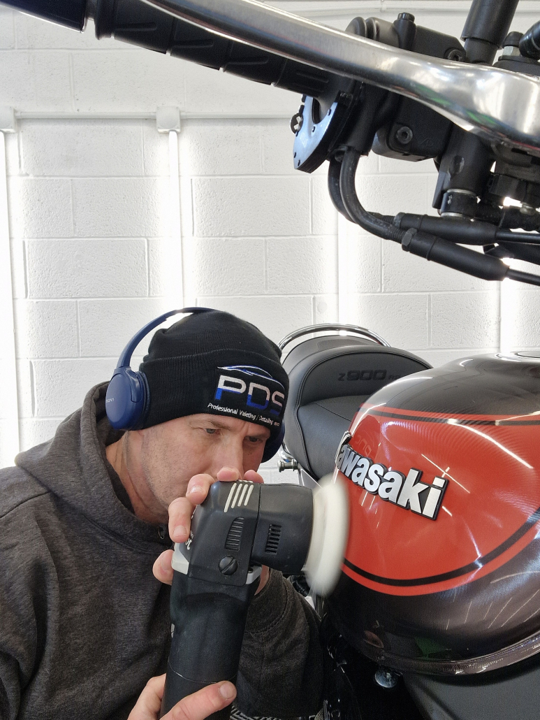 motorbike being machine polished