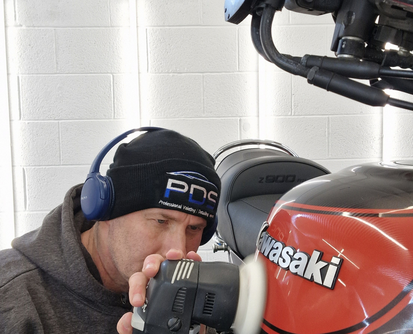 motorbike being machine polished